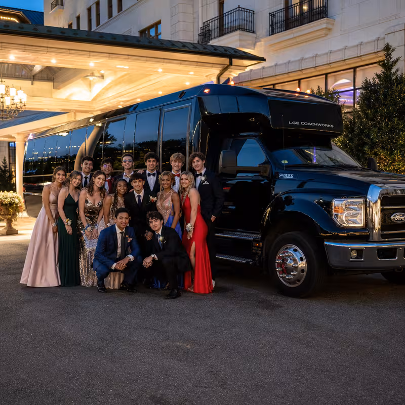 Party bus interior with wraparound leather seating and LED lighting in Anaheim