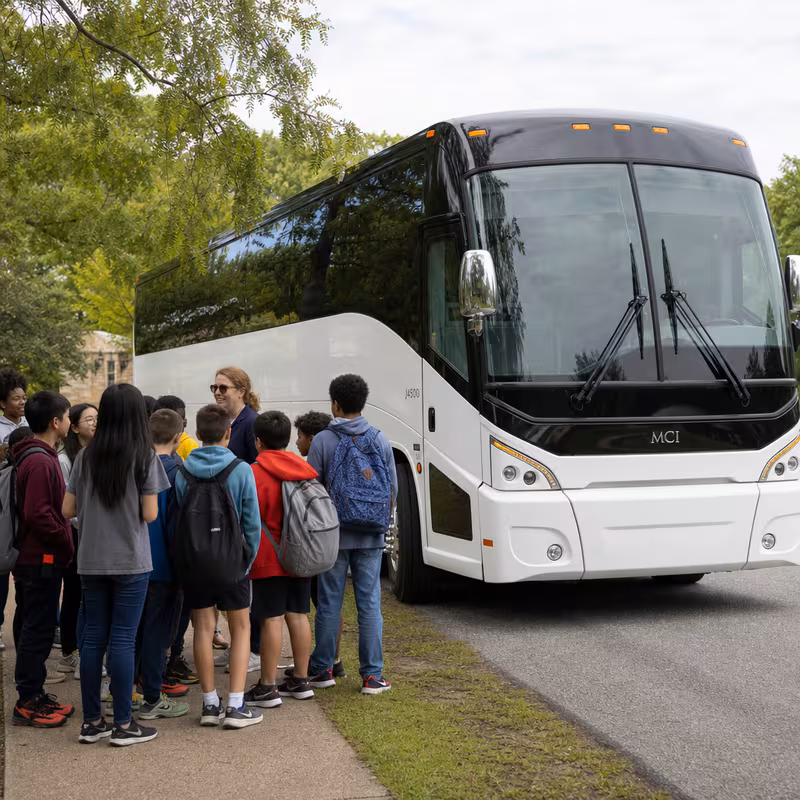 Black Mercedes Sprinter van staged for an Anaheim School Transportation group