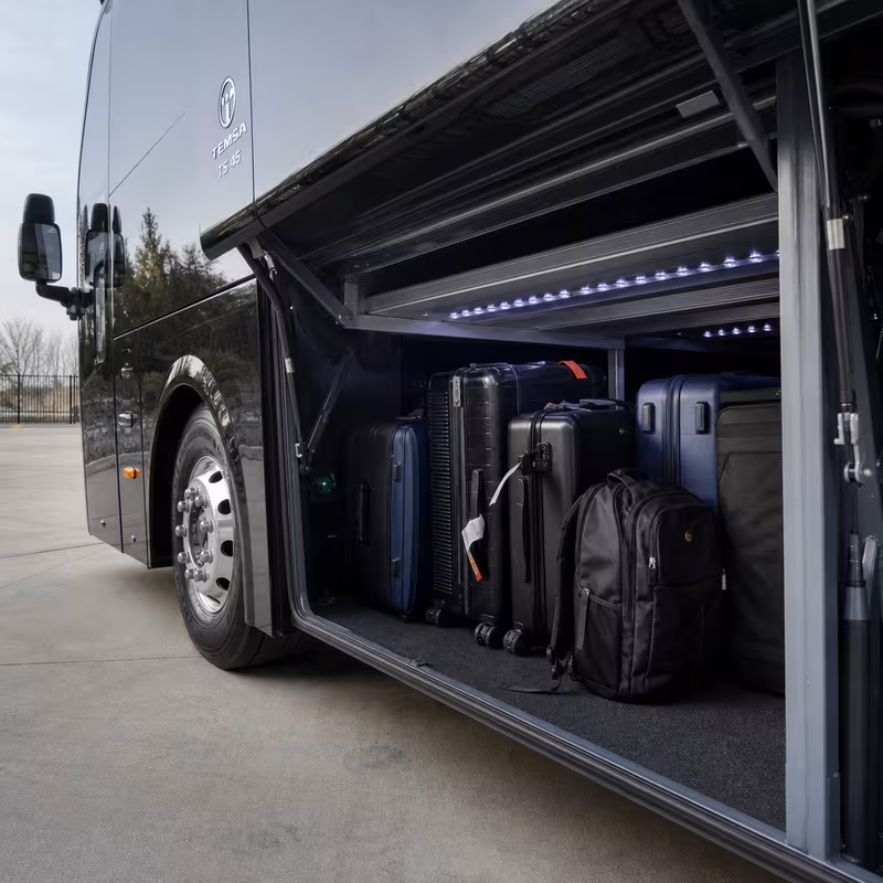 Party bus interior with wraparound leather seating and LED lighting in Anaheim
