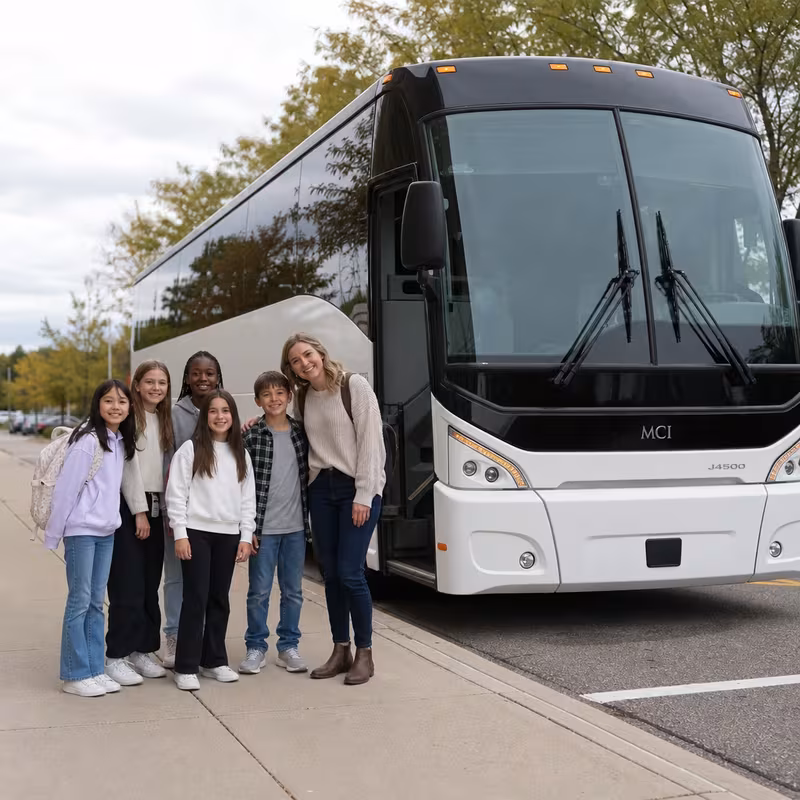 Passengers loading luggage while boarding an Anaheim group shuttle
