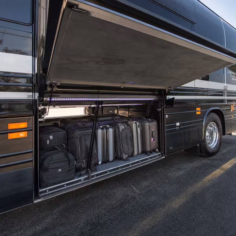Party bus interior with wraparound leather seating and LED lighting in Anaheim