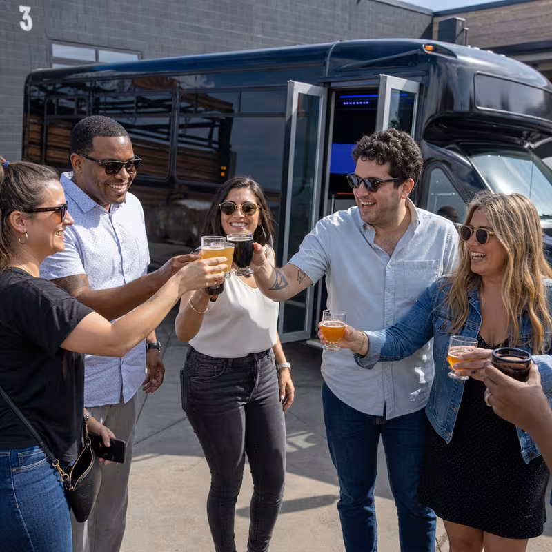 Passengers loading luggage while boarding an Anaheim group shuttle